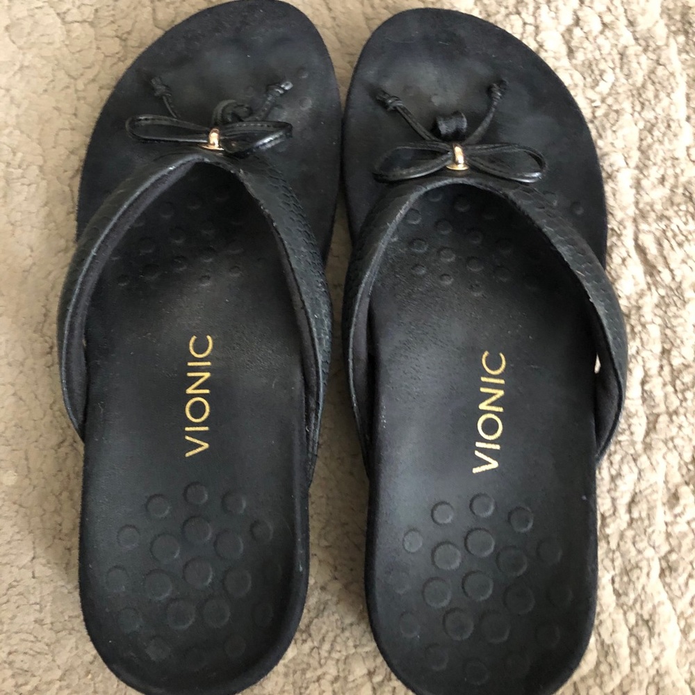 Bionic black bow tie flip flops